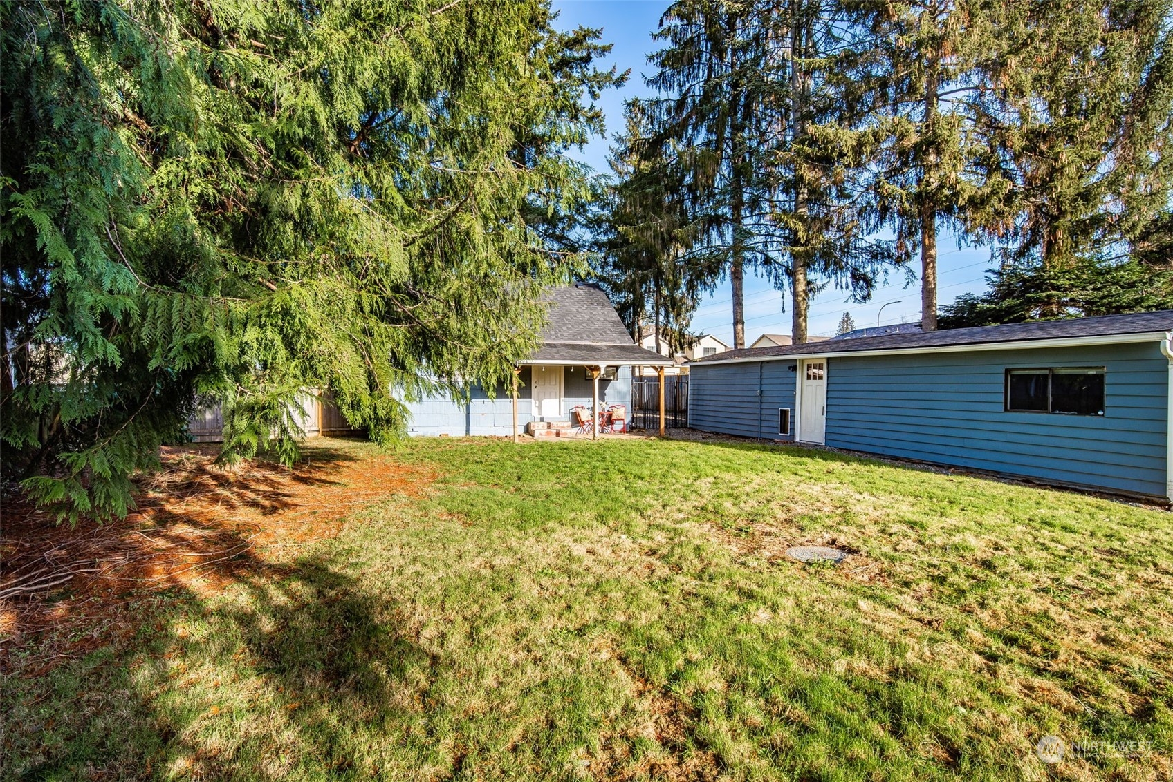 3617 Northeast 12th Street Renton, WA 98056 - Photo 27 of 33 a front view of a house with a tree