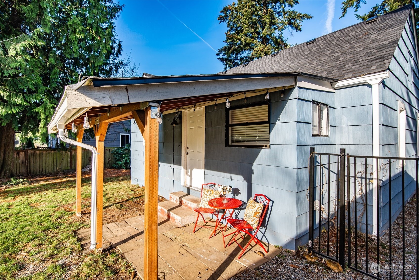 3617 Northeast 12th Street Renton, WA 98056 - Photo 30 of 33 a backyard of a house with seating space