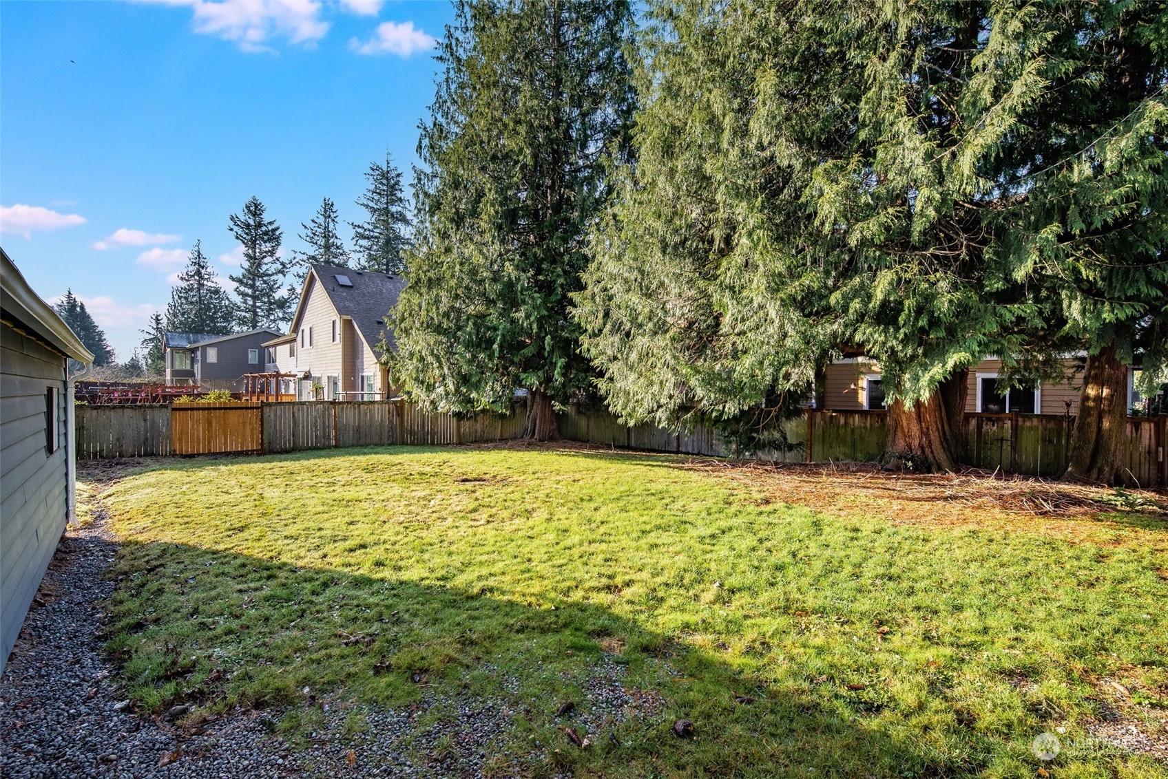 3617 Northeast 12th Street Renton, WA 98056 - Photo 33 of 33 a swimming pool with trees in the background