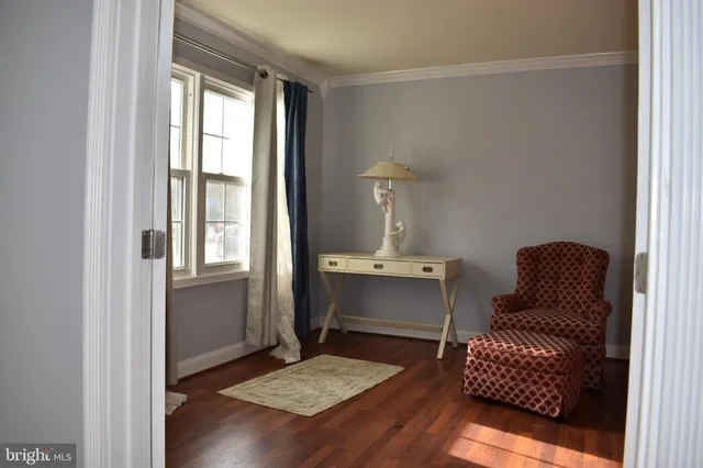 a room with furniture and a window