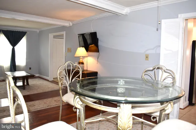 a bathroom with a sink a mirror and a bathtub