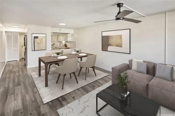 a living room with furniture and wooden floor