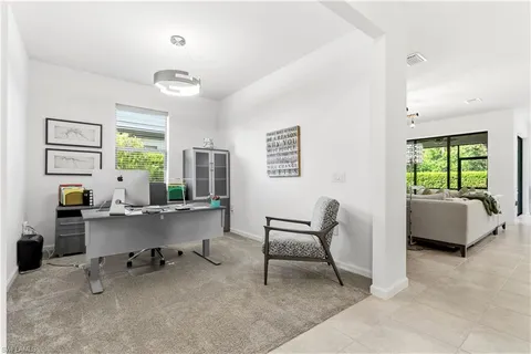 a room with furniture and a window