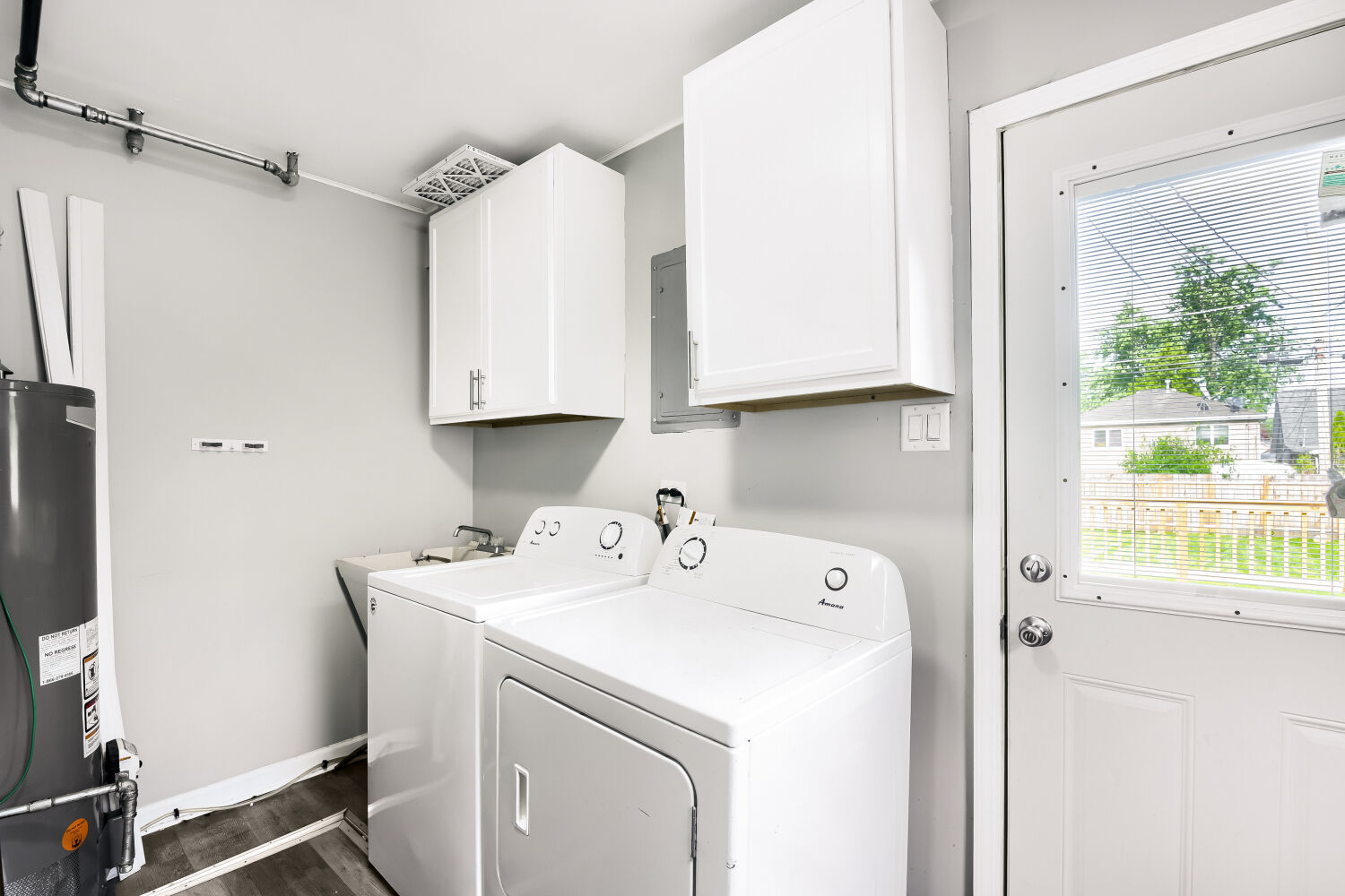 15013 Springfield Avenue Midlothian, IL 60445 - Photo 15 of 17 a utility room with dryer and washer