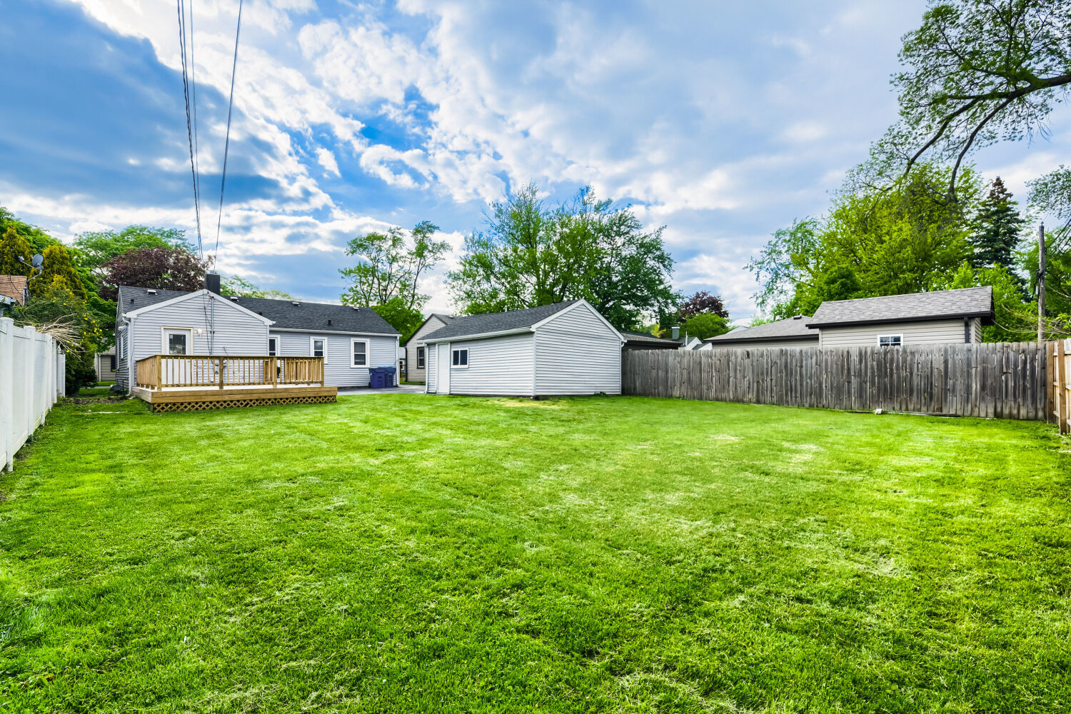 15013 Springfield Avenue Midlothian, IL 60445 - Photo 17 of 17 a view of house with backyard and a garden