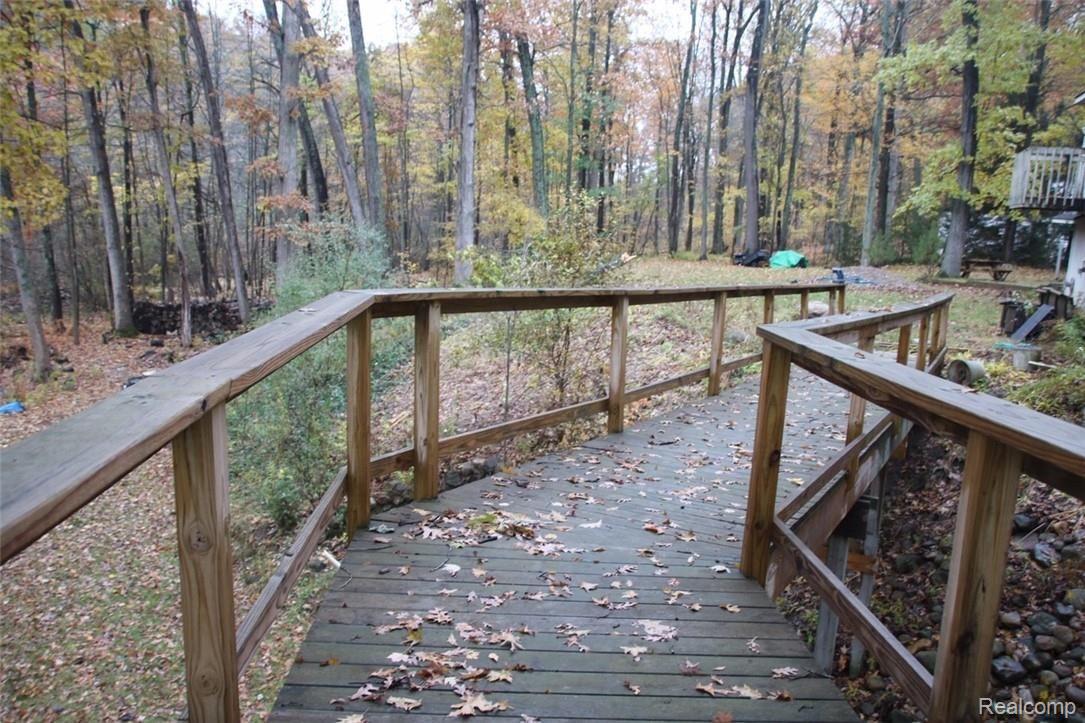 6854 Big Trail Road Holly, MI 48442 - Photo 19 of 23 Walkway from garage to backyard