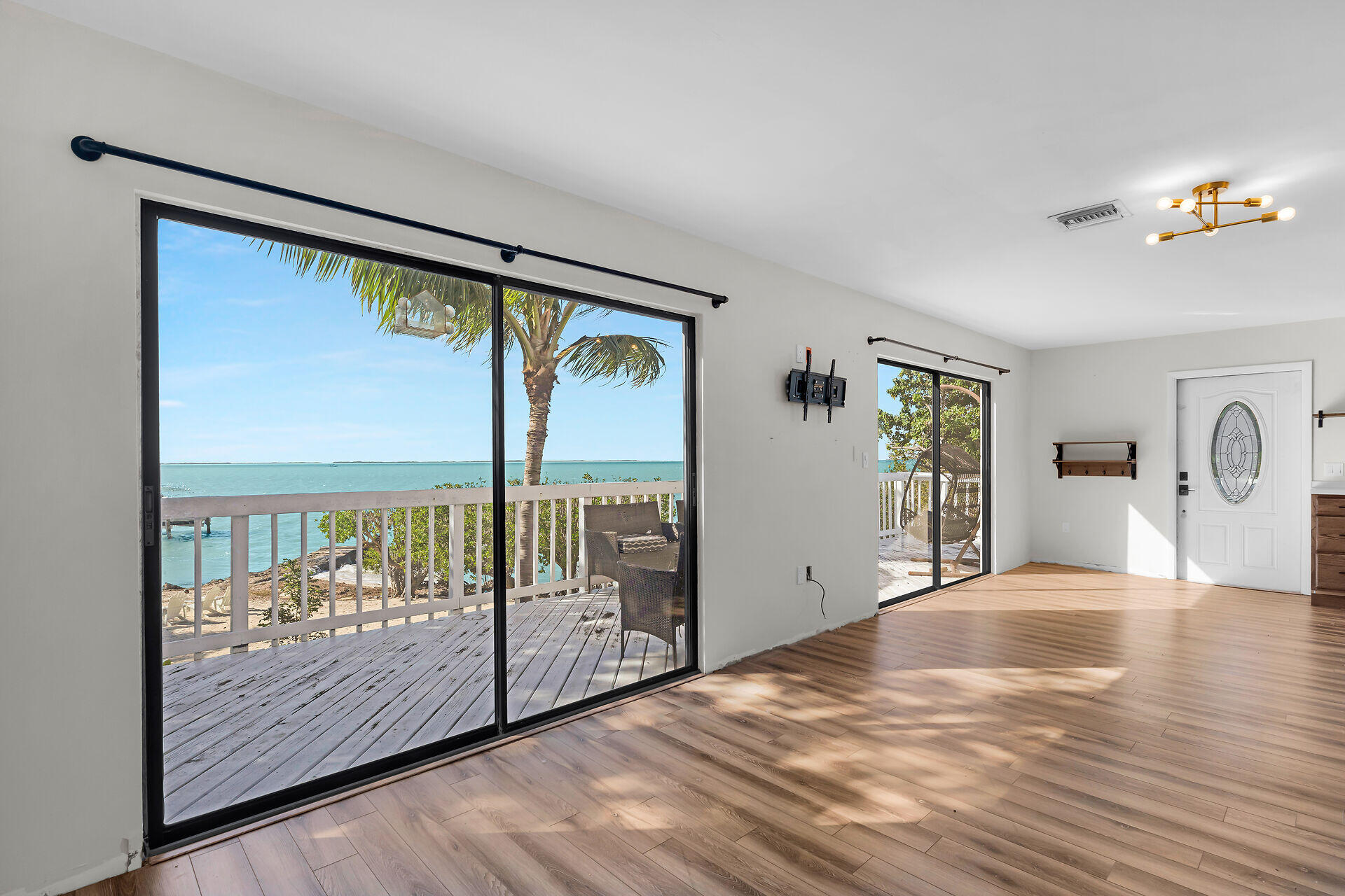 100 Point Pleasant Drive Key Largo, FL 33037 - Photo 13 of 32 a view of an empty room with a window