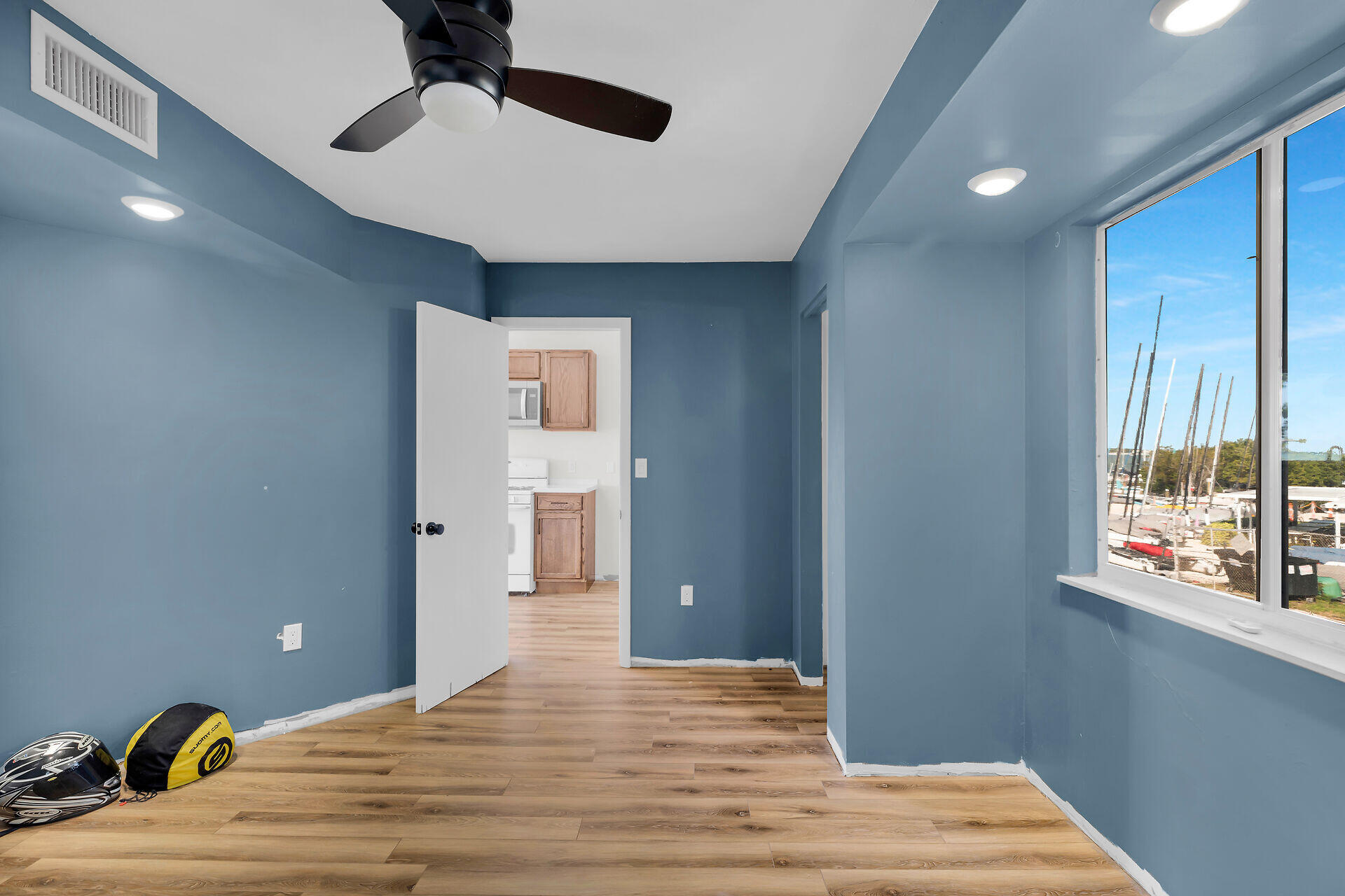 100 Point Pleasant Drive Key Largo, FL 33037 - Photo 20 of 32 a bedroom with a bed and a window