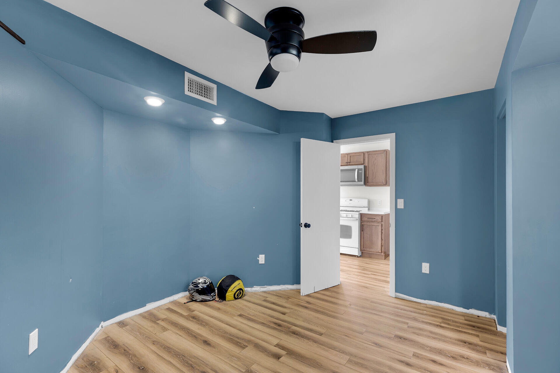100 Point Pleasant Drive Key Largo, FL 33037 - Photo 21 of 32 a bedroom with a bed and a chandelier