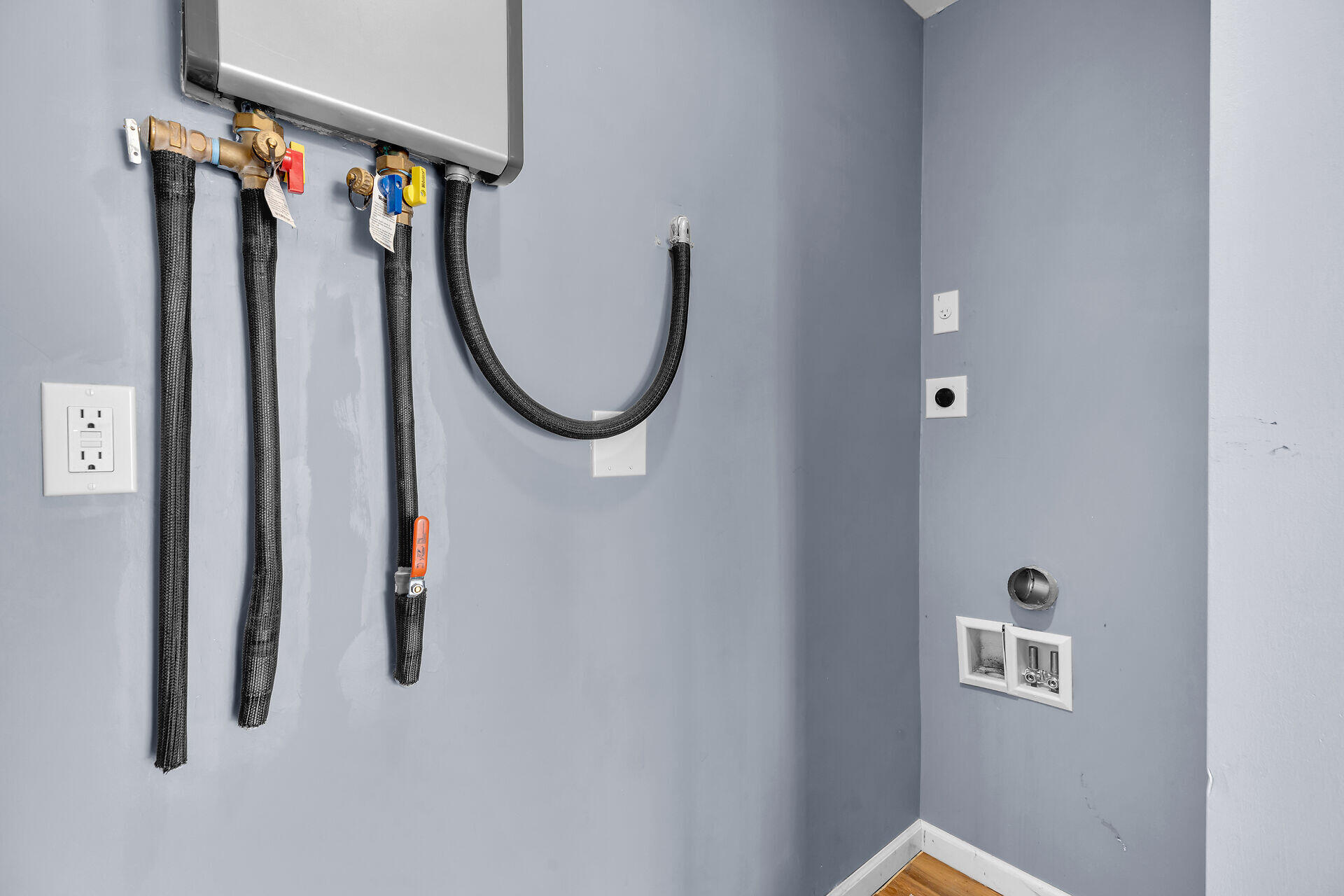 100 Point Pleasant Drive Key Largo, FL 33037 - Photo 26 of 32 a close view of walk in closet with clothes