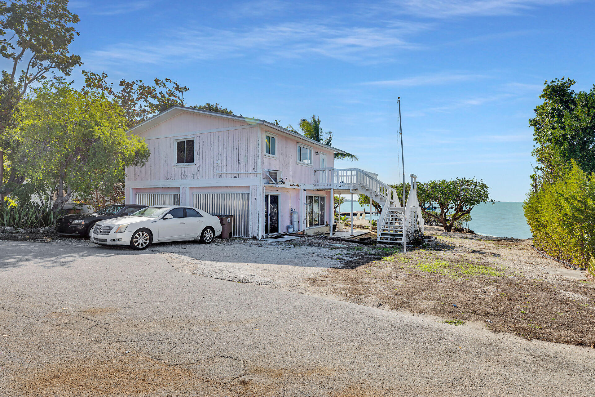 100 Point Pleasant Drive Key Largo, FL 33037 - Photo 5 of 32 a view of a house with a patio