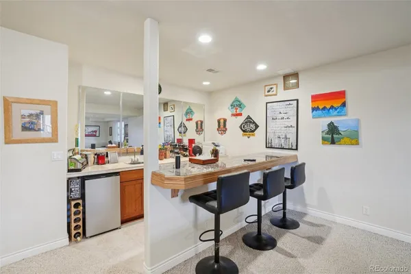 a view of a kitchen and dining room