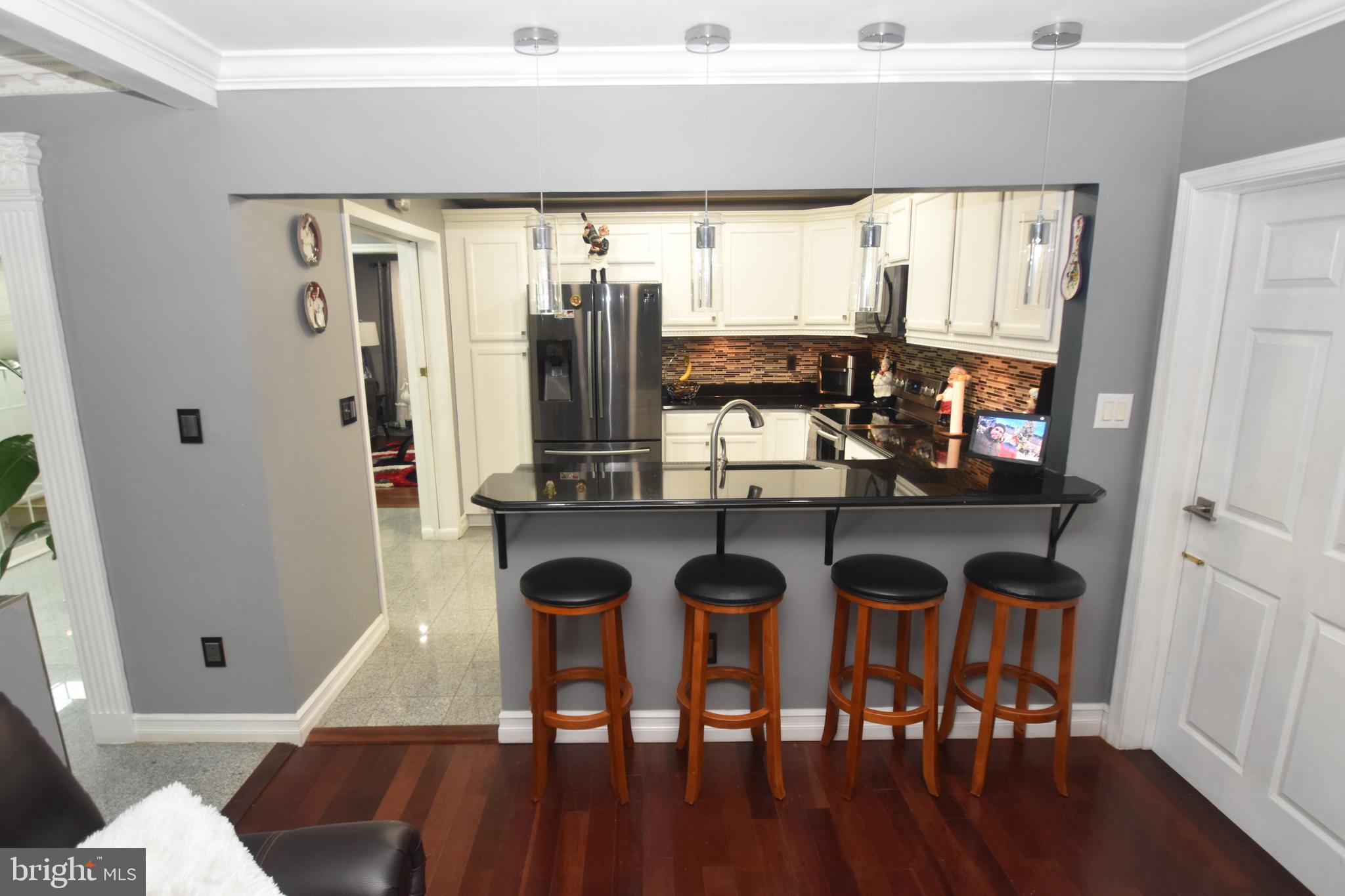 145 West Rutherford Drive Newark, DE 19713 - Photo 30 of 50 Bar Seating at Granite Counter