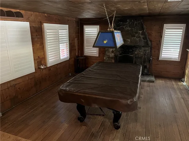 a bathroom with a glass door shower and a mirror