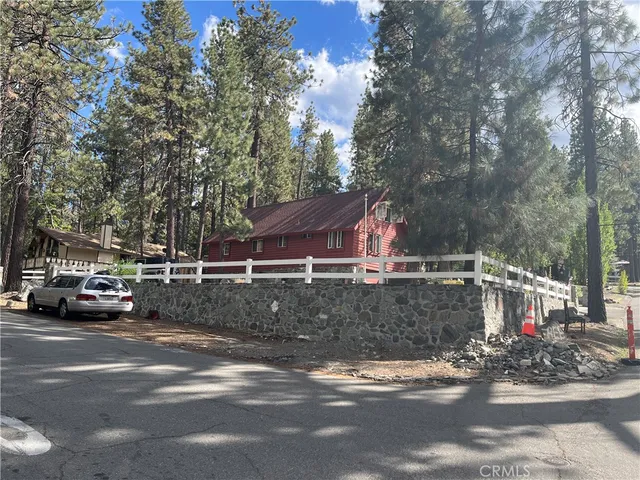 a view of street with parked cars