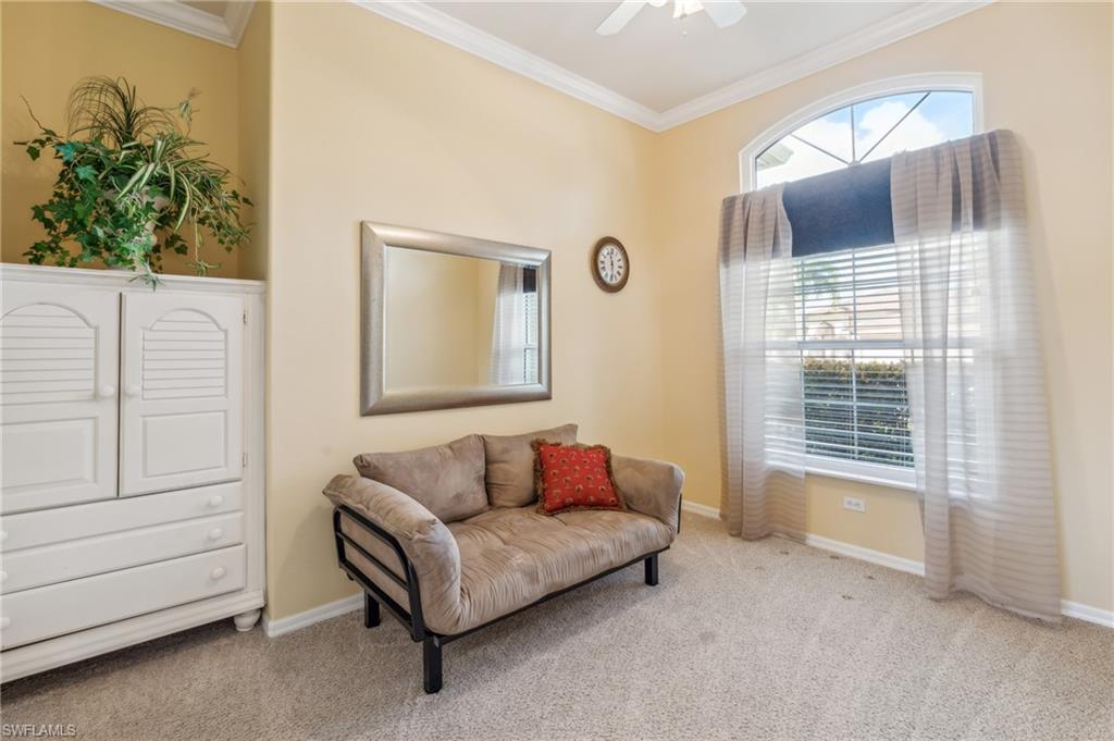 11446 Stratham Loop Estero, FL 33928 - Photo 15 of 27 a living room with furniture and a flat screen tv