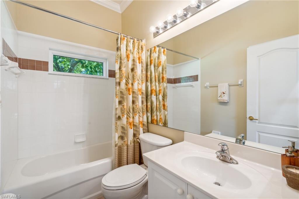 11446 Stratham Loop Estero, FL 33928 - Photo 20 of 27 a bathroom with a sink a toilet and shower