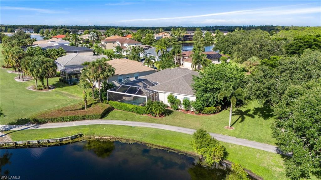 11446 Stratham Loop Estero, FL 33928 - Photo 5 of 27 an aerial view of a house with a yard