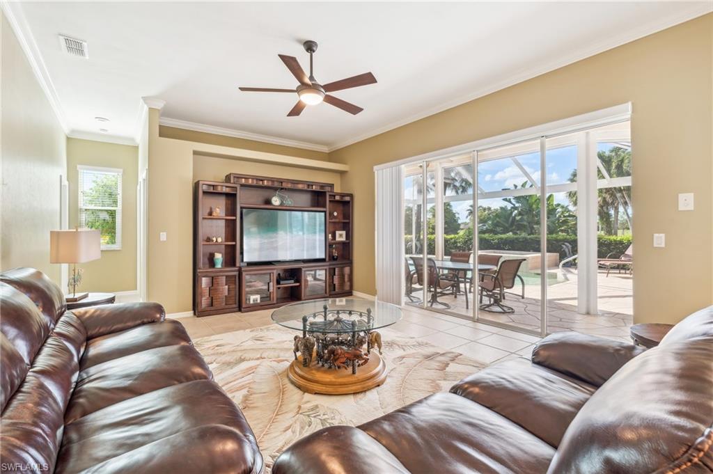11446 Stratham Loop Estero, FL 33928 - Photo 6 of 27 a living room with furniture and a large window