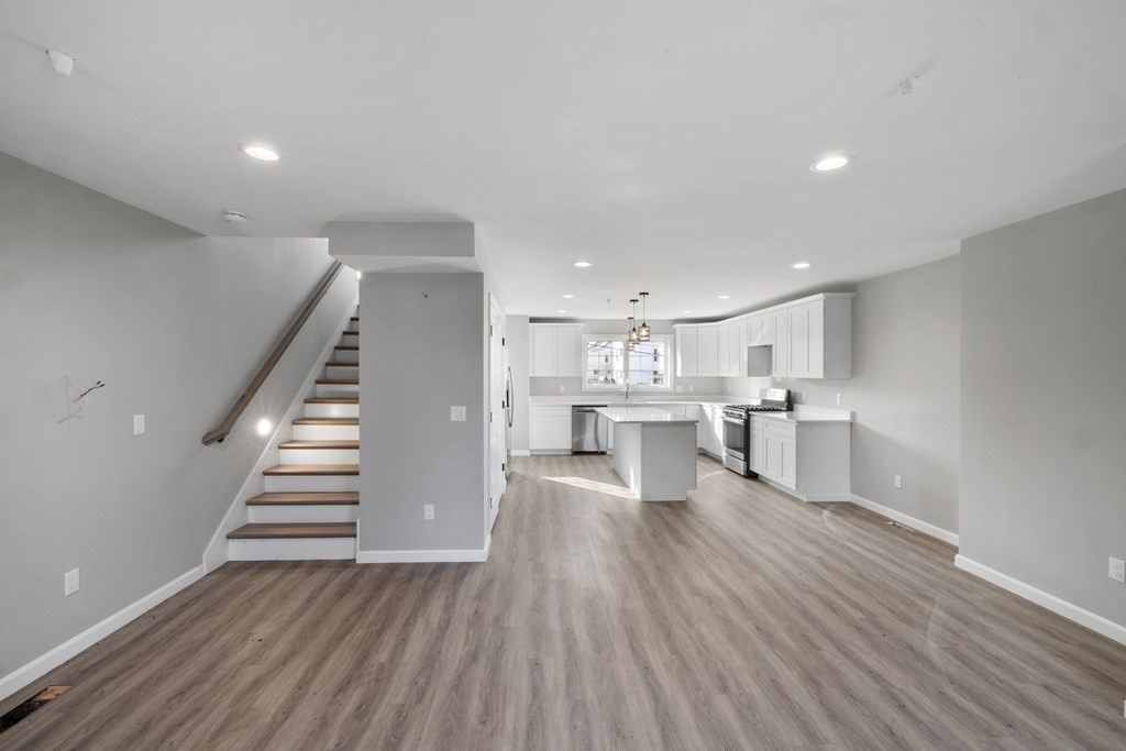 550 Spring Street, Unit 2 Fall River, MA 02721 - Photo 10 of 23 a view of kitchen with wooden floor