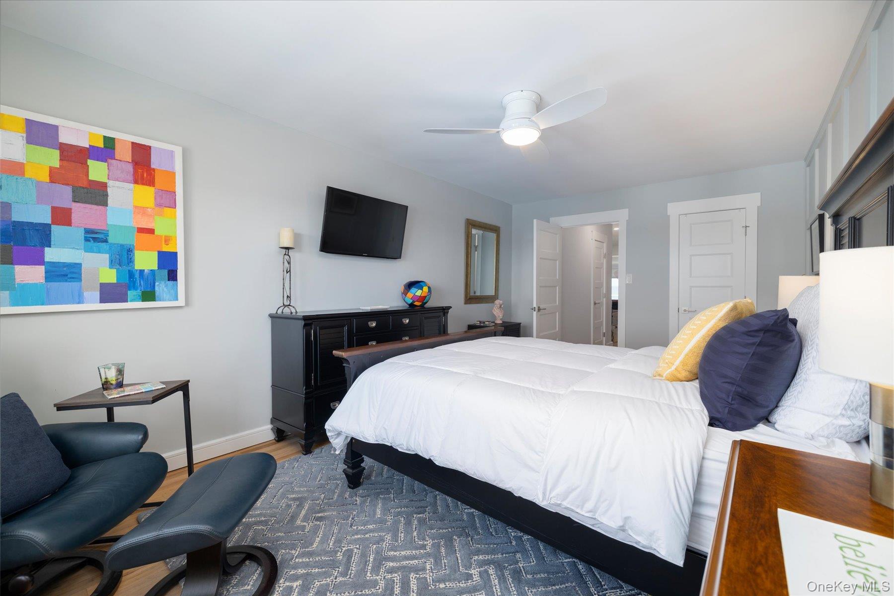 522 Shore Road, Unit 3BB Long Beach, NY 11561 - Photo 14 of 27 Oversized bedroom with hardwood floors, recessed lighting, and walk-in closet