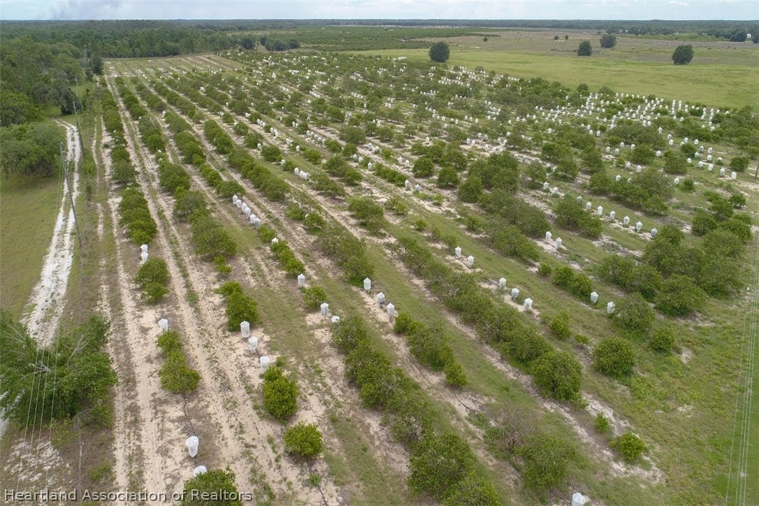 Old Avon Road Frostproof, FL 33843 - Photo 20 of 34 a view of an outdoor space and a lake view