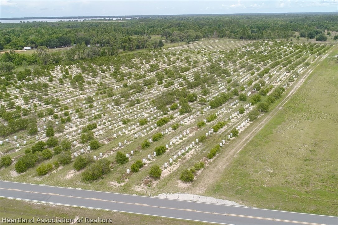 Old Avon Road Frostproof, FL 33843 - Photo 2 of 34 a view of a yard from a balcony