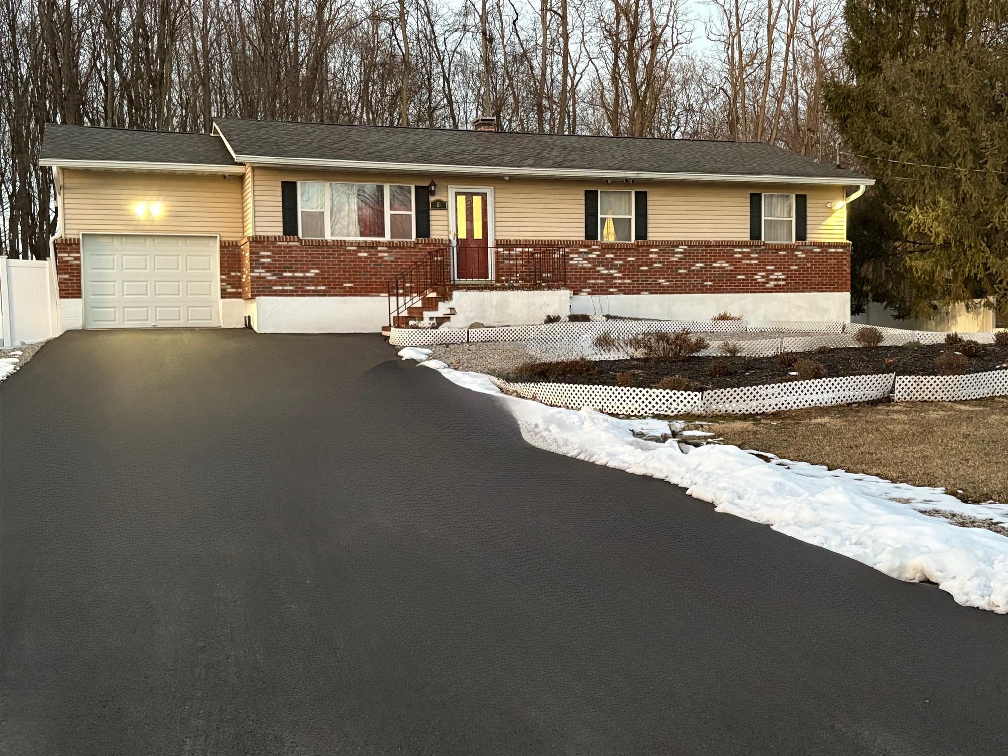 83 Spring Street Poughkeepsie, NY 12601 - Photo 1 of 1 Single story home with a garage and over a half acre lot.