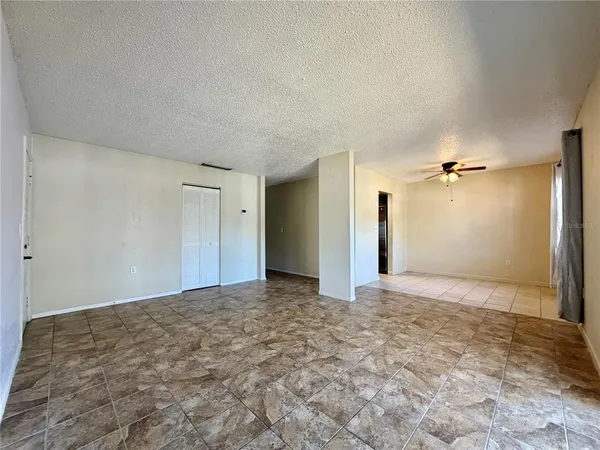 a view of a big room with closet area