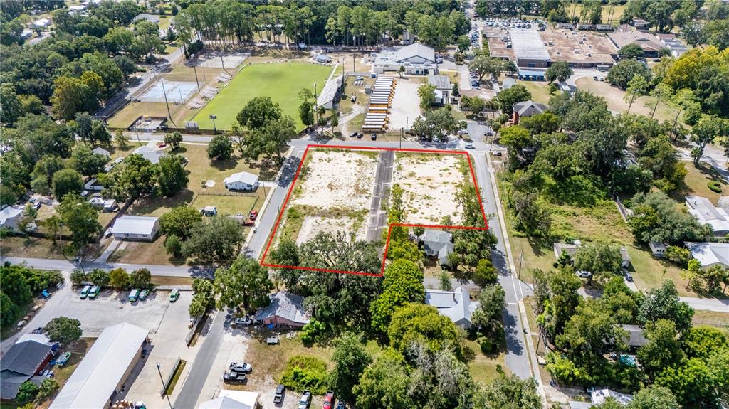 0 Southwest 1st Road Newberry, FL 32669 - Photo 7 of 10 an aerial view of residential houses with outdoor space and swimming pool