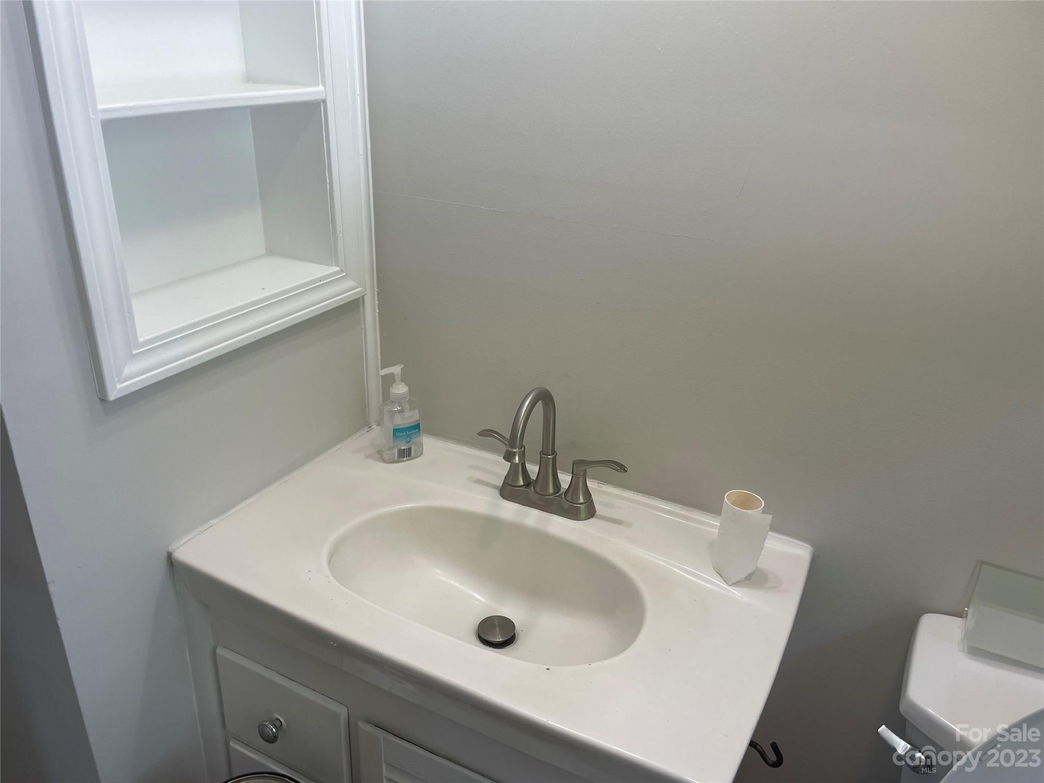 1607 Mt Gallant Road Rock Hill, SC 29732 - Photo 16 of 23 a bathroom with a sink and a mirror