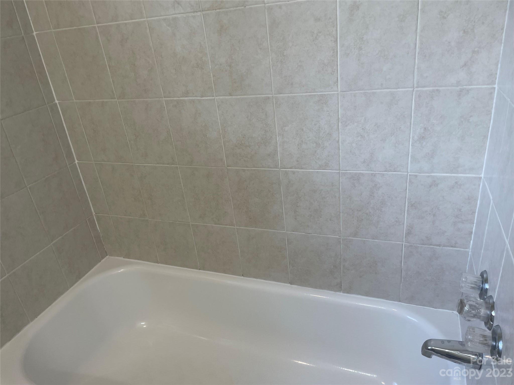 1607 Mt Gallant Road Rock Hill, SC 29732 - Photo 17 of 23 a close up of a bathtub