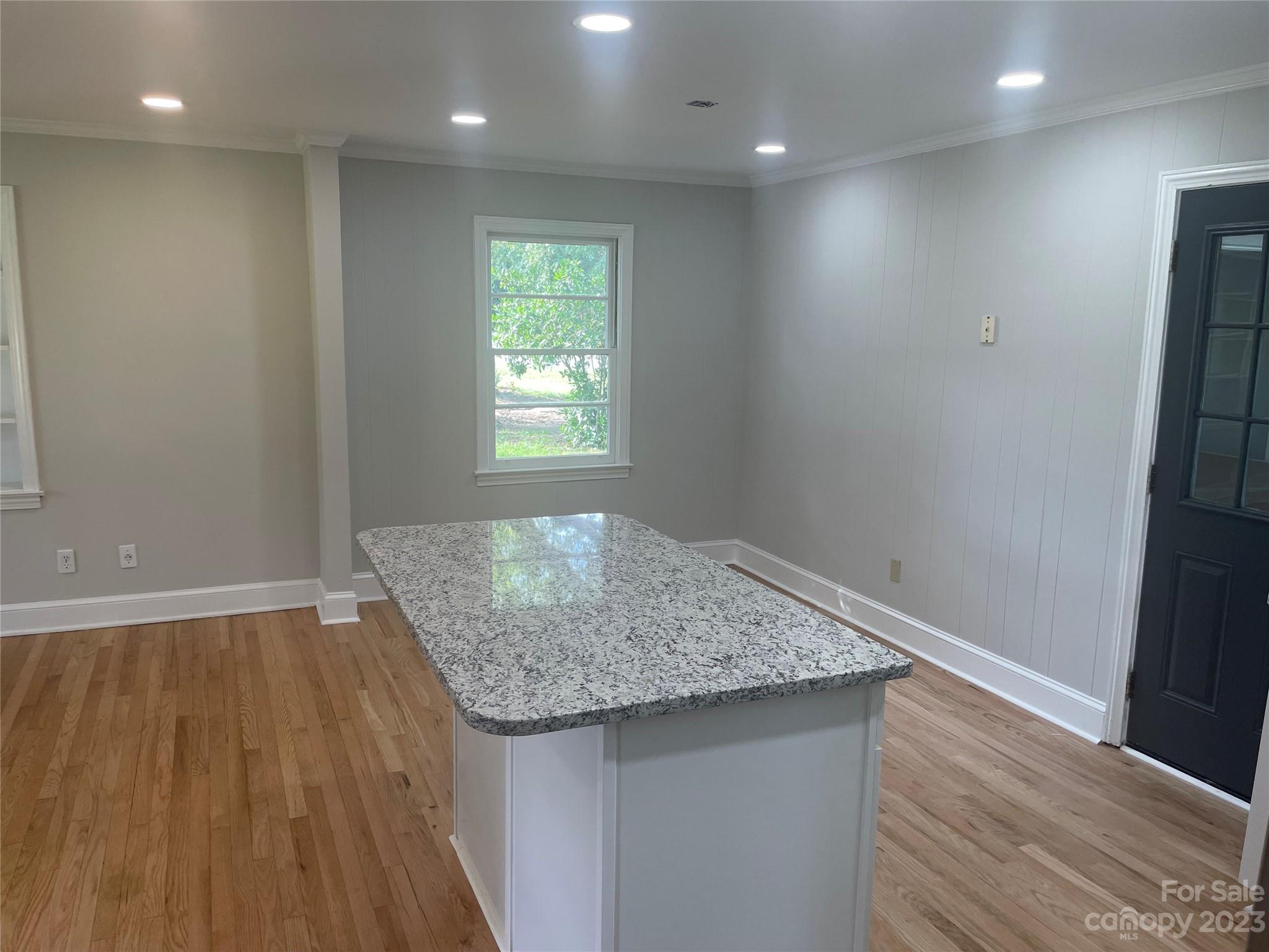 1607 Mt Gallant Road Rock Hill, SC 29732 - Photo 9 of 23 an empty room with wooden floor and entrance