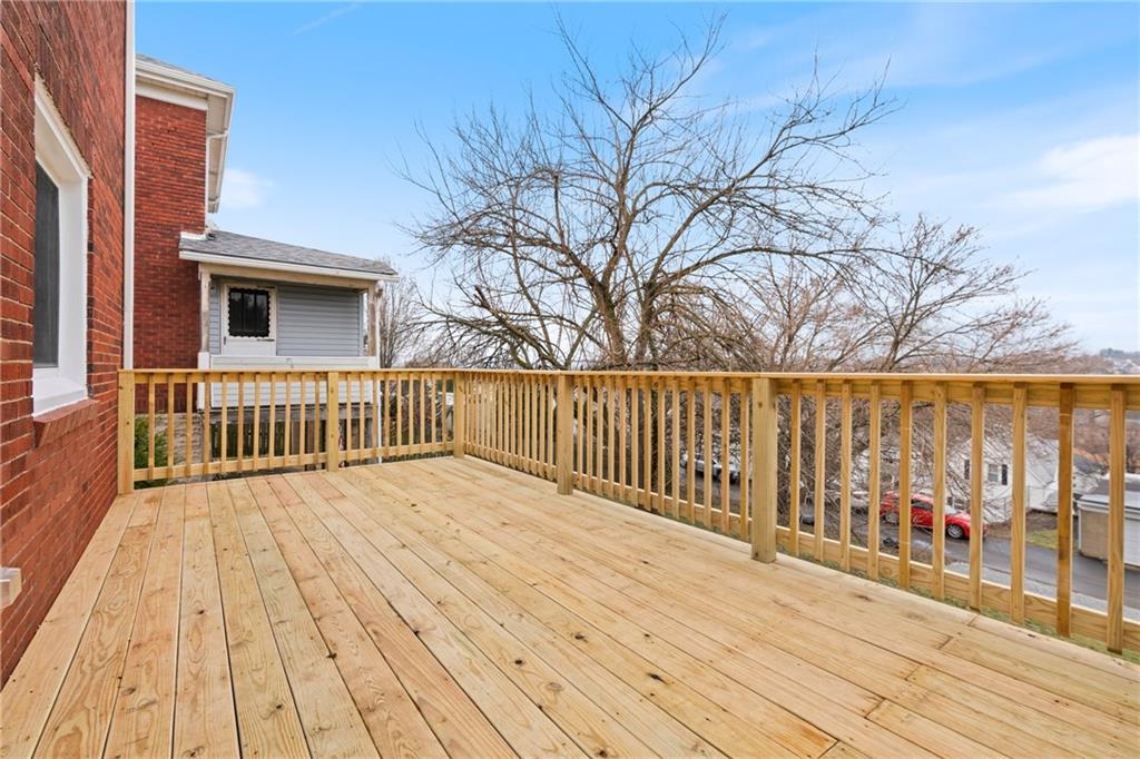 2441 Dewey Street Homestead, PA 15120 - Photo 12 of 27 a view of terrace with wooden floor and fence