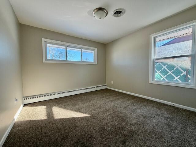 606 North Lindberg Street Griffith, IN 46319 - Photo 8 of 12 an empty room with a window