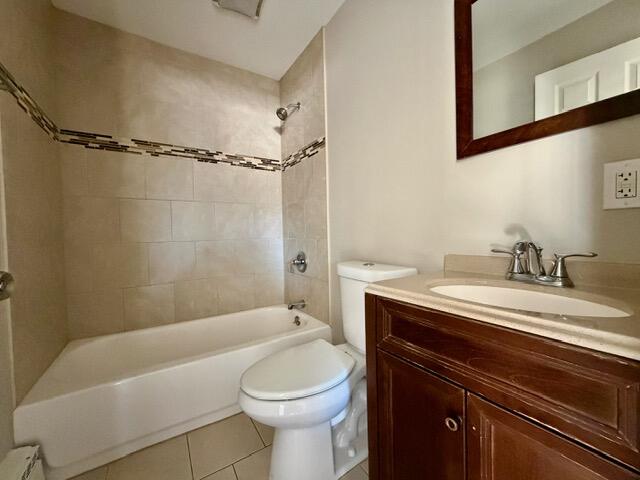 606 North Lindberg Street Griffith, IN 46319 - Photo 9 of 12 a bathroom with a sink a toilet and shower