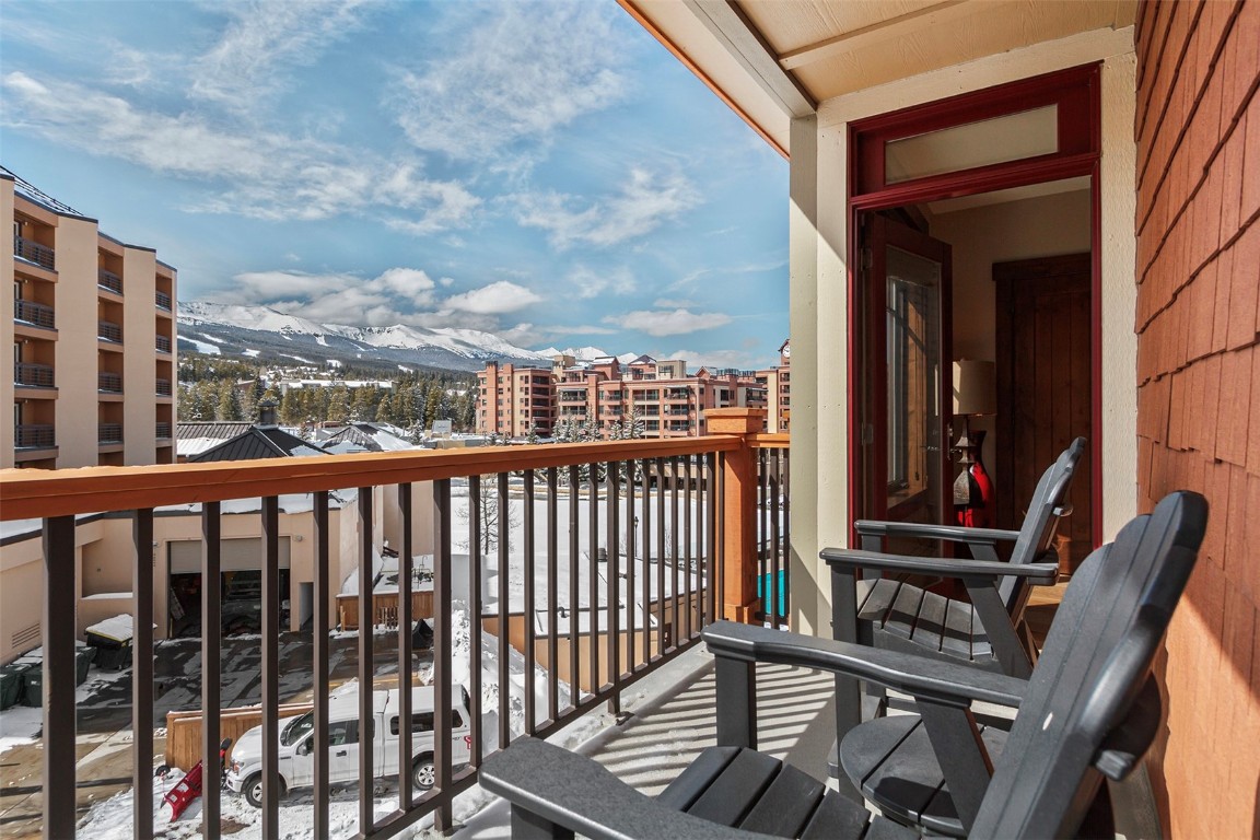 610 Columbine Road, Unit 6308 Breckenridge, CO 80424 - Photo 1 of 49 a view of a balcony with a chairs