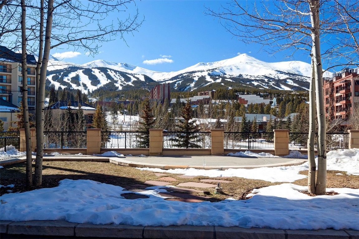 610 Columbine Road, Unit 6308 Breckenridge, CO 80424 - Photo 33 of 49 a view of a building with a yard