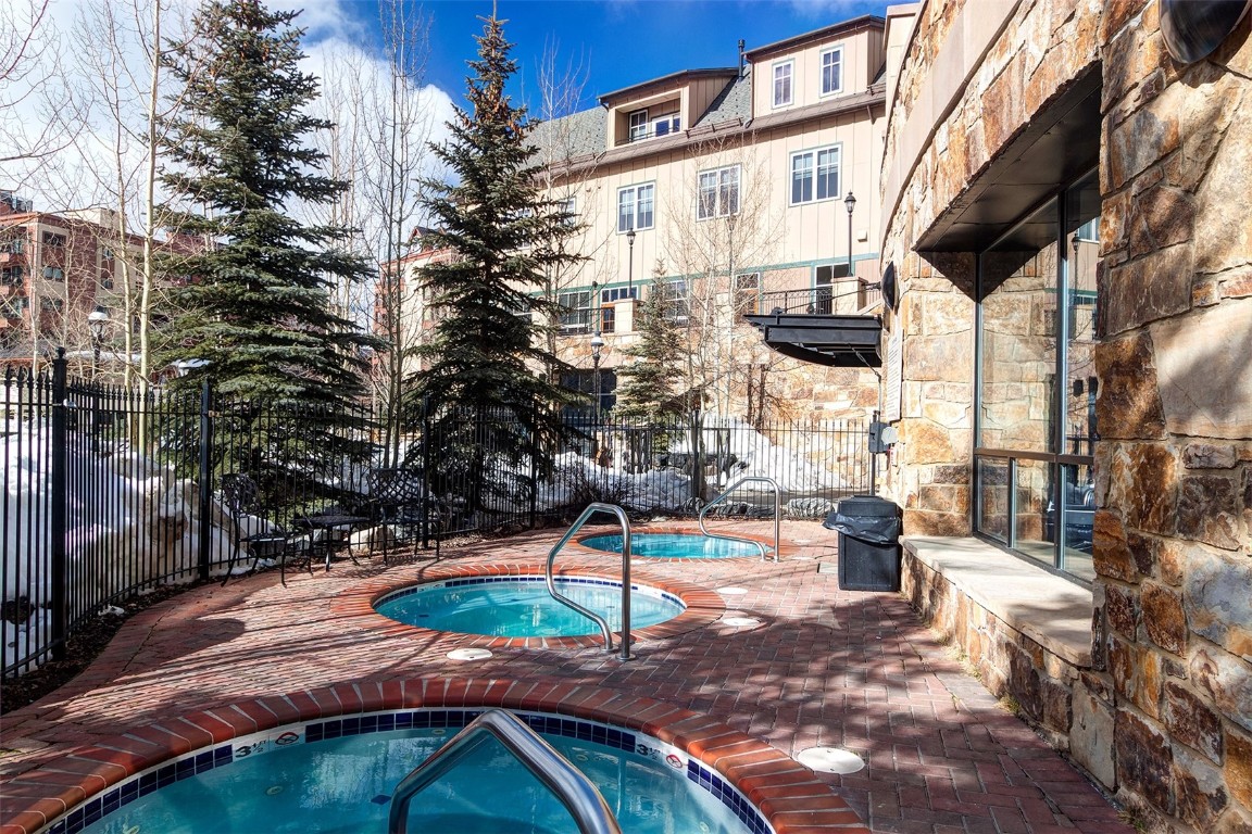 610 Columbine Road, Unit 6308 Breckenridge, CO 80424 - Photo 34 of 49 a view of a building with backyard