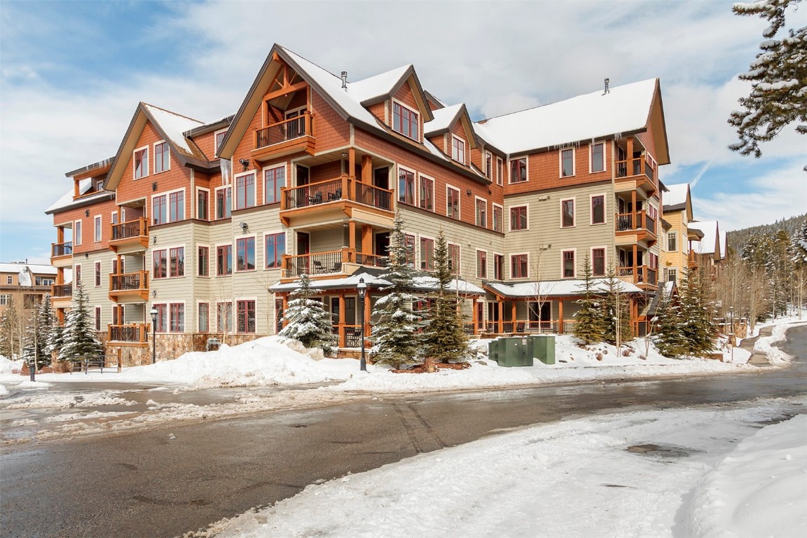 610 Columbine Road, Unit 6308 Breckenridge, CO 80424 - Photo 5 of 49 a front view of a building and a street