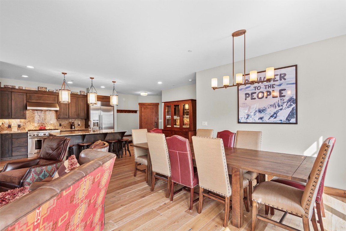 610 Columbine Road, Unit 6308 Breckenridge, CO 80424 - Photo 9 of 49 a view of a dining room with furniture