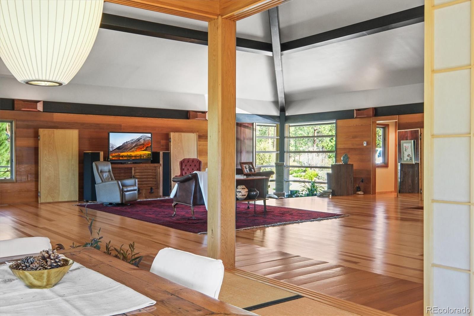 682 Buddy Road Bailey, CO 80421 - Photo 23 of 50 a very nice looking living room with a large window with outer view