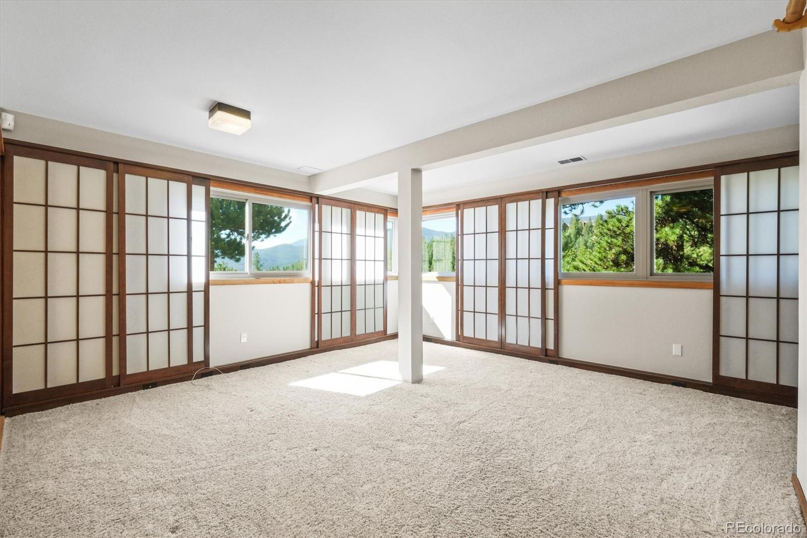 682 Buddy Road Bailey, CO 80421 - Photo 28 of 50 a view of an empty room with a window