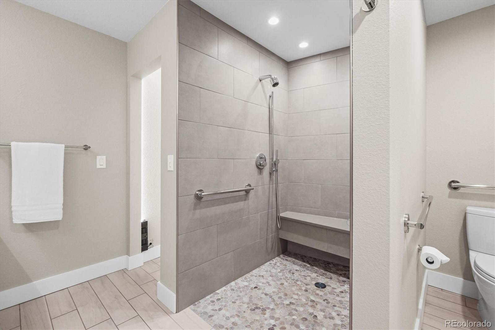 682 Buddy Road Bailey, CO 80421 - Photo 32 of 50 a bathroom with a shower and a toilet