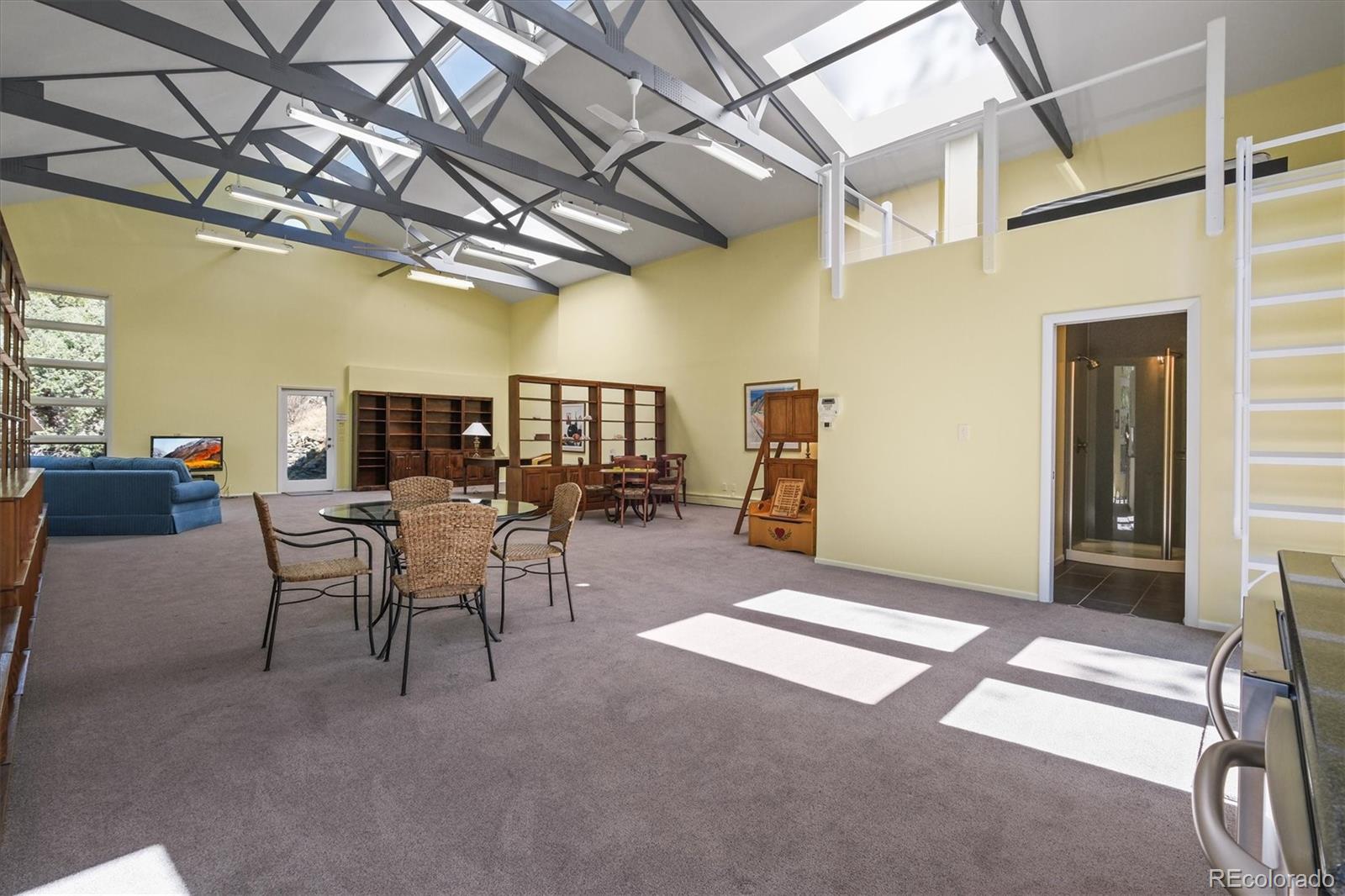 682 Buddy Road Bailey, CO 80421 - Photo 40 of 50 a view of a livingroom with furniture and a window