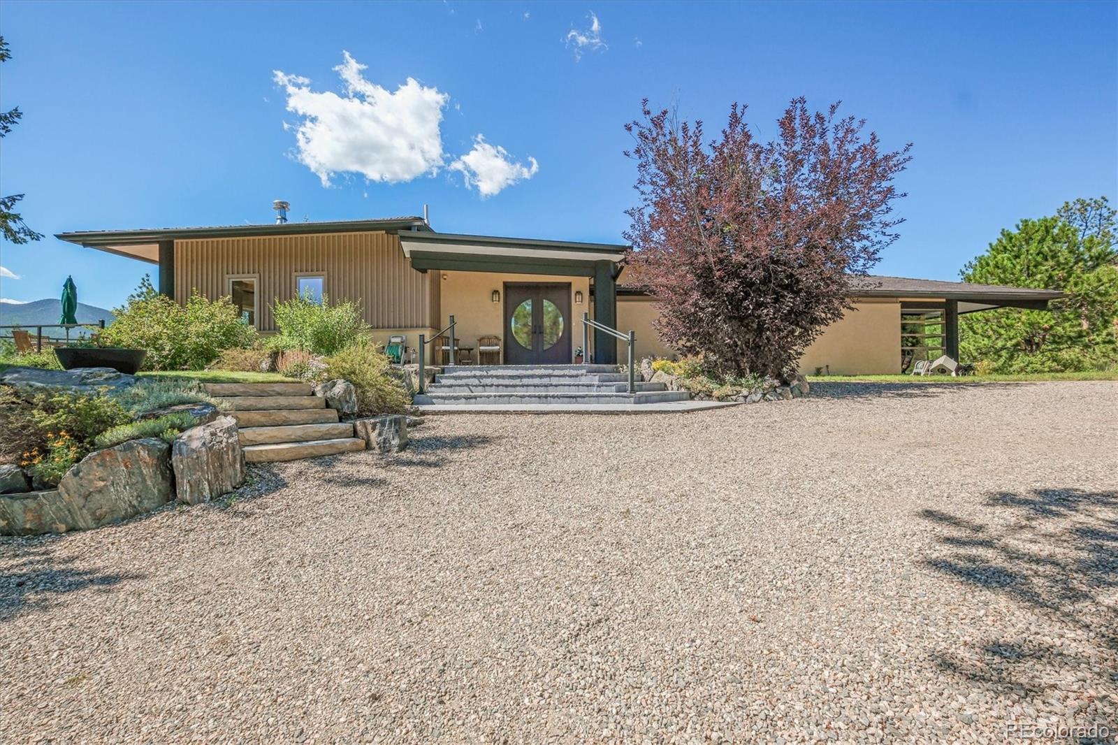 682 Buddy Road Bailey, CO 80421 - Photo 46 of 50 front view of a house with a yard