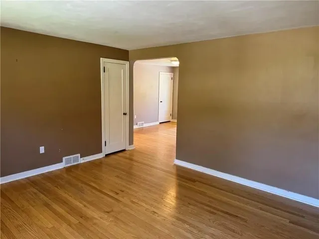 a view of a bathroom from a hallway