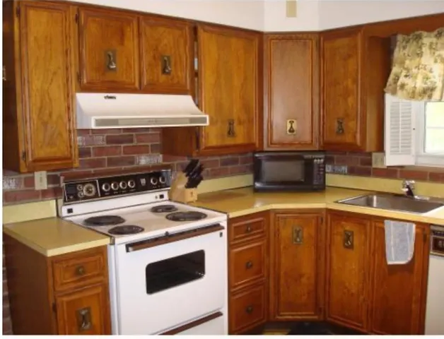 a bathroom with a sink a mirror and shower