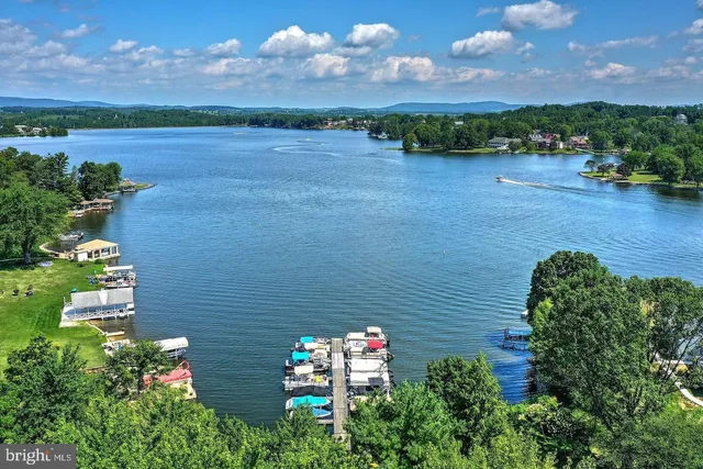 a aerial view of a house with a yard