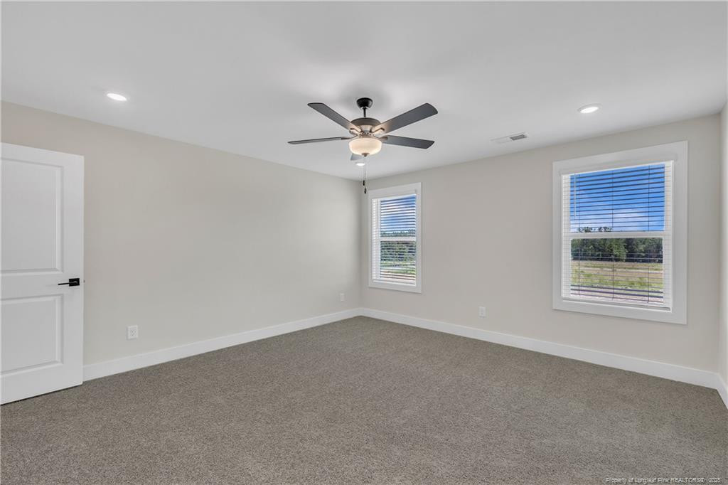 136 Camp Rock Road Lillington, NC 27546 - Photo 25 of 43 en view of an empty room with a window